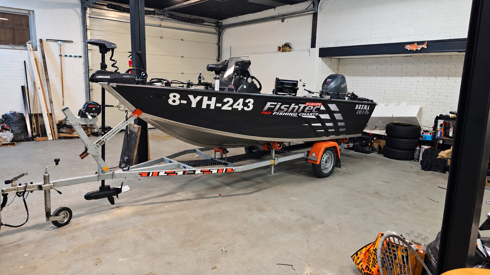 Boat stored indoors in the private garage