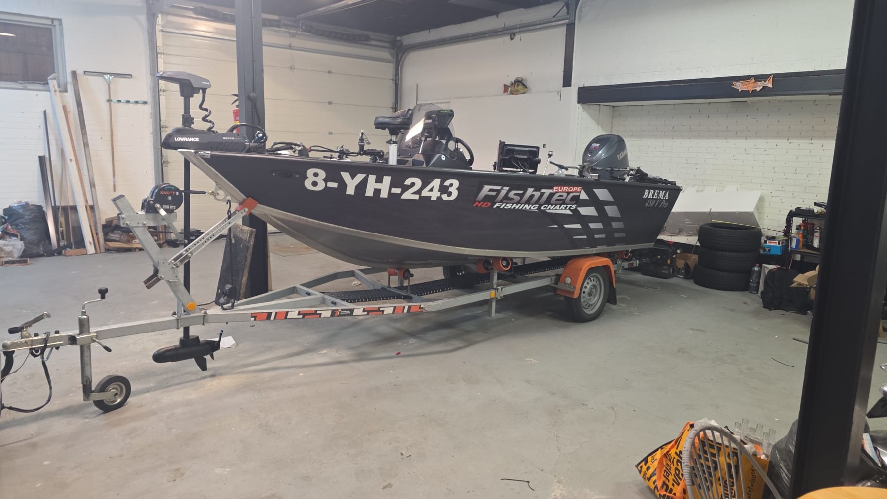 Boat stored indoors in the private garage