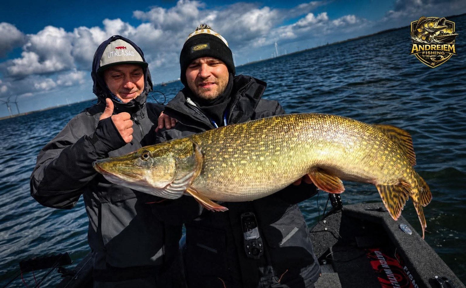 Andrei and a guest with a pike on the Dutch delta